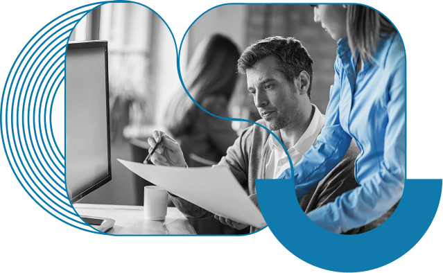 Business professionals analyzing technical Whitepaper and eBook about Salesforce CRM and ERP solutions.